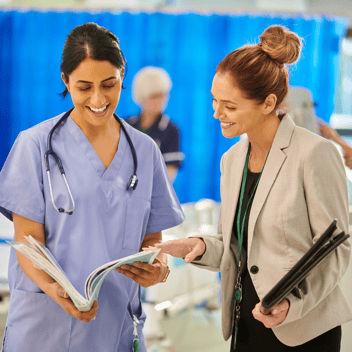 Healthcare Administrator talking to a Doctor