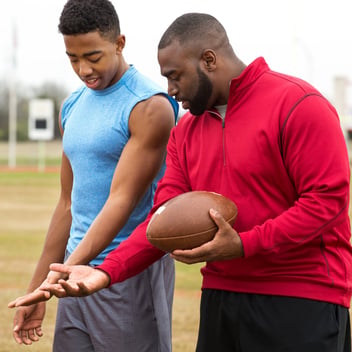 Athletics Coach with Player