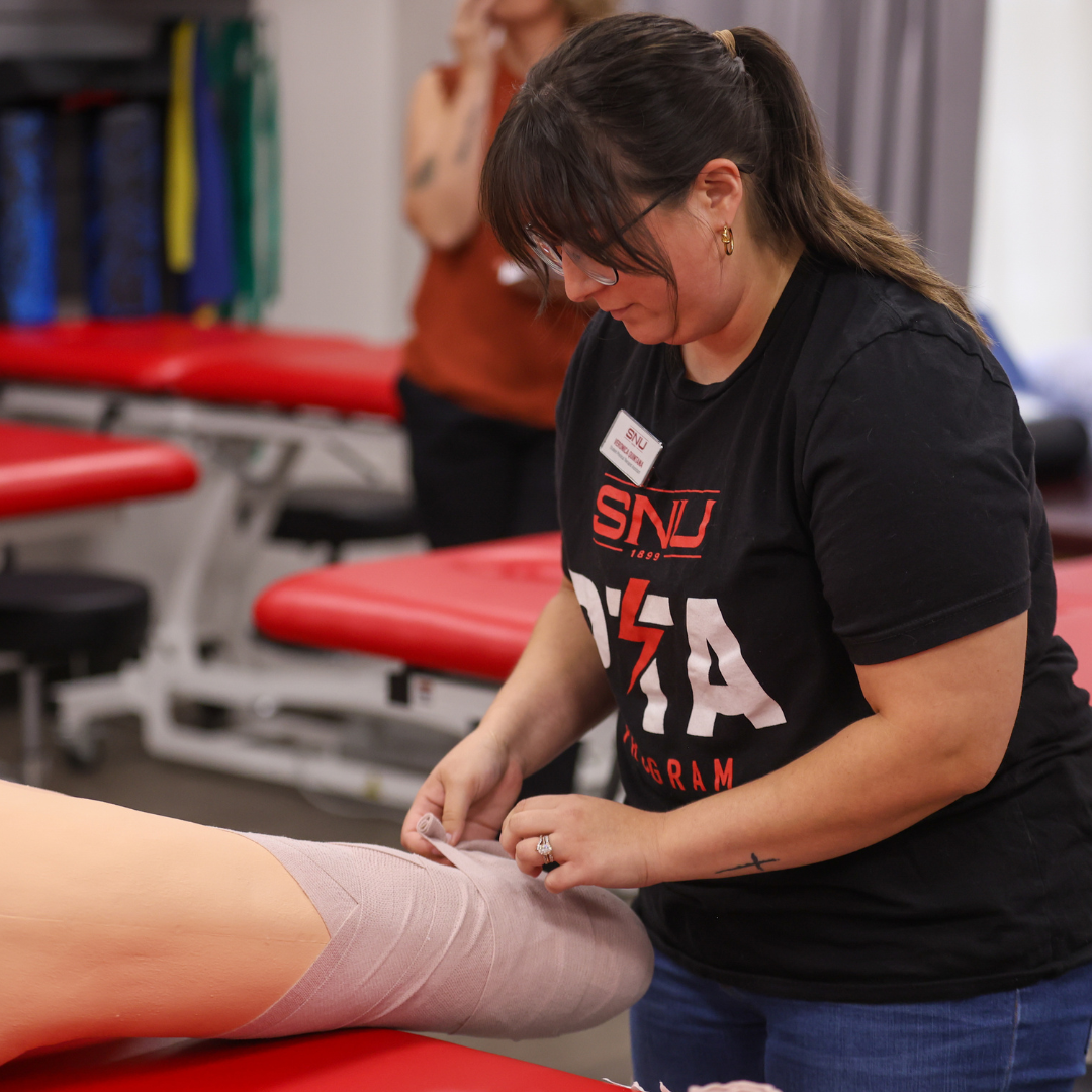 Physical Therapist Assistant Student Practicing Skills