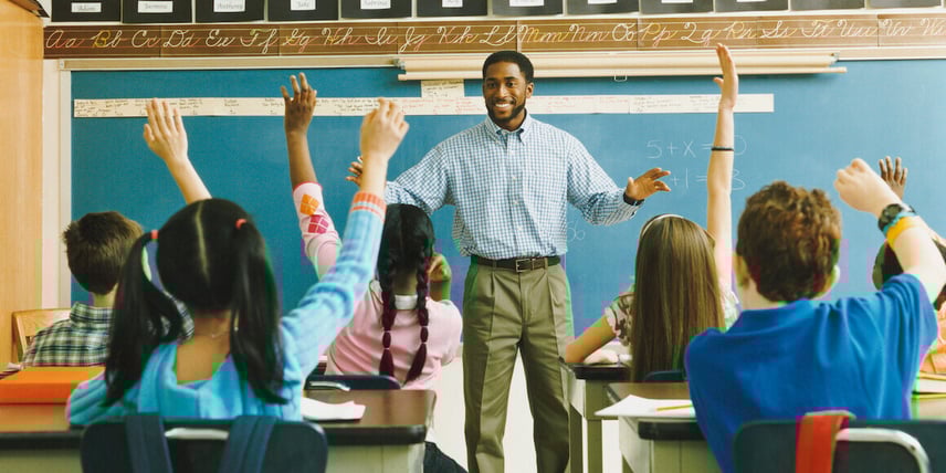 SNU MAT grad teaching elementary students in a classroom