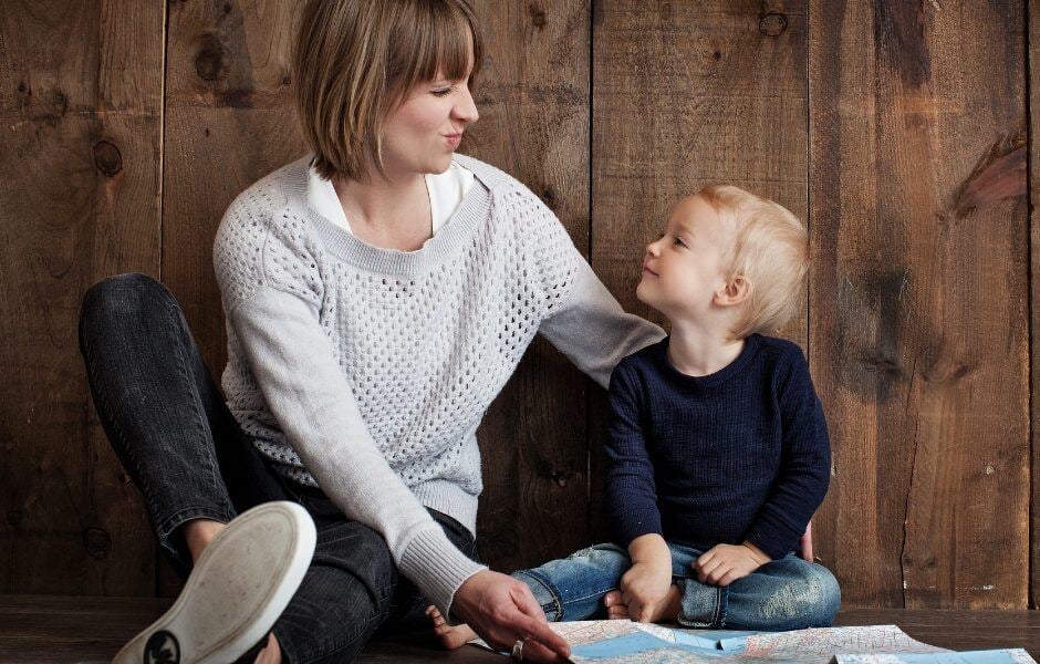 woman and child looking at each other