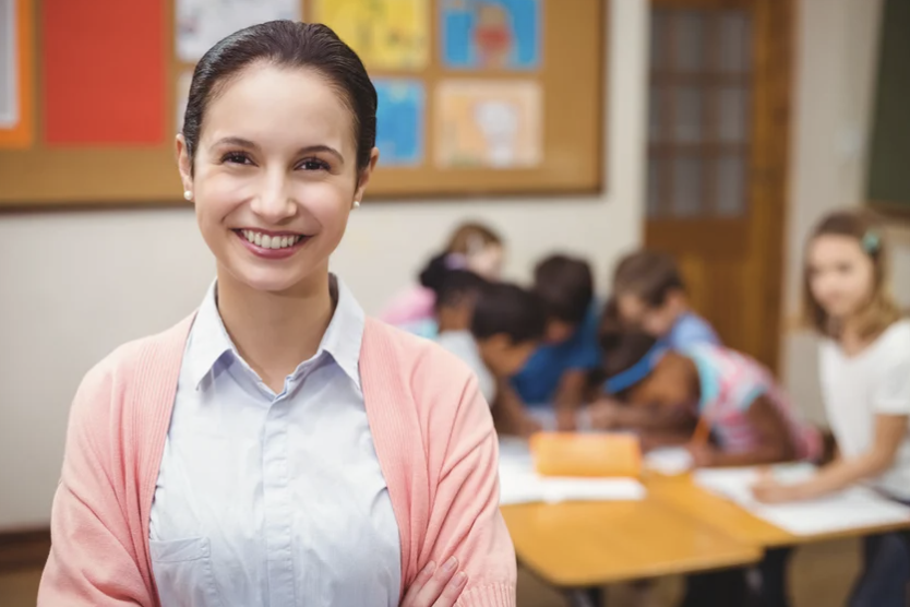 Teacher in classroom with students
