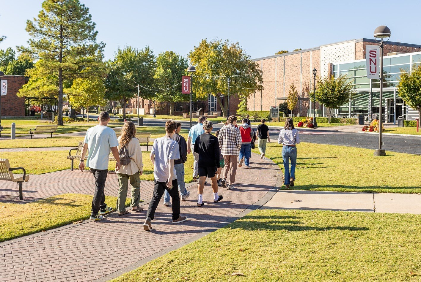Young people exploring Southern Nazarene University's campus.