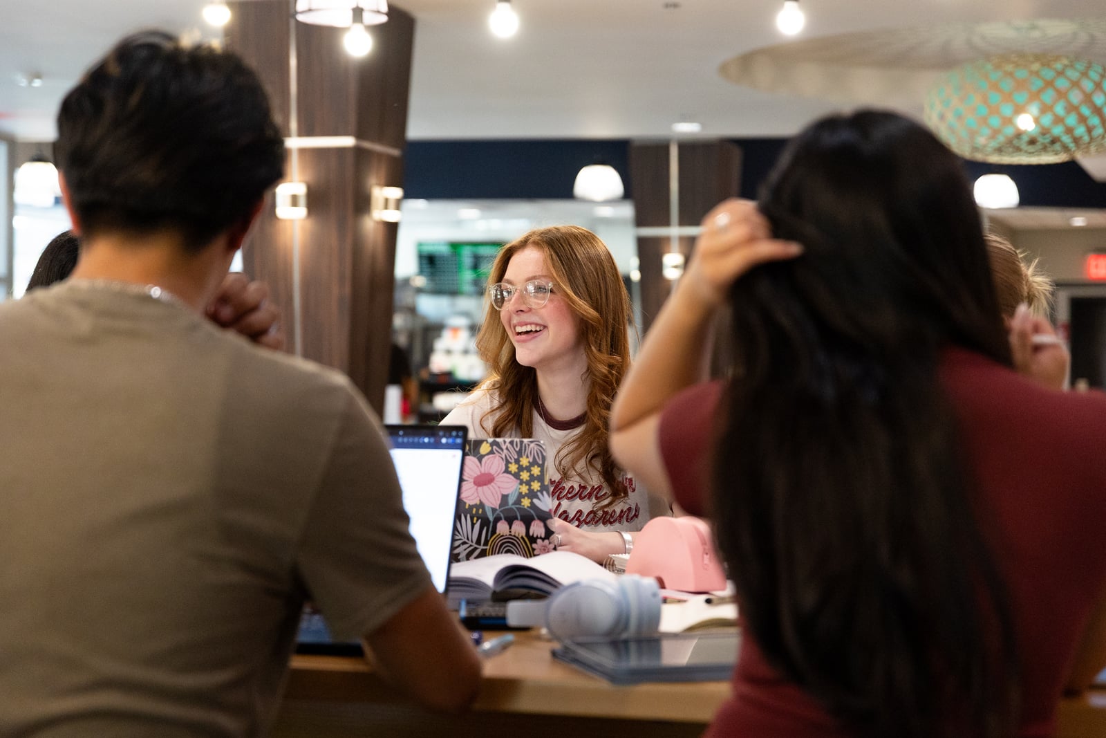 Students interacting in the campus cafe.