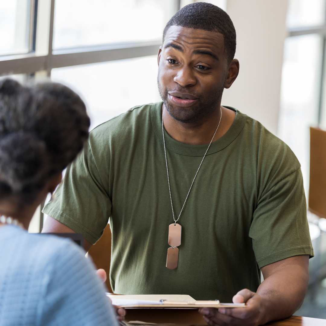 Veteran Student Speaking with Advisor