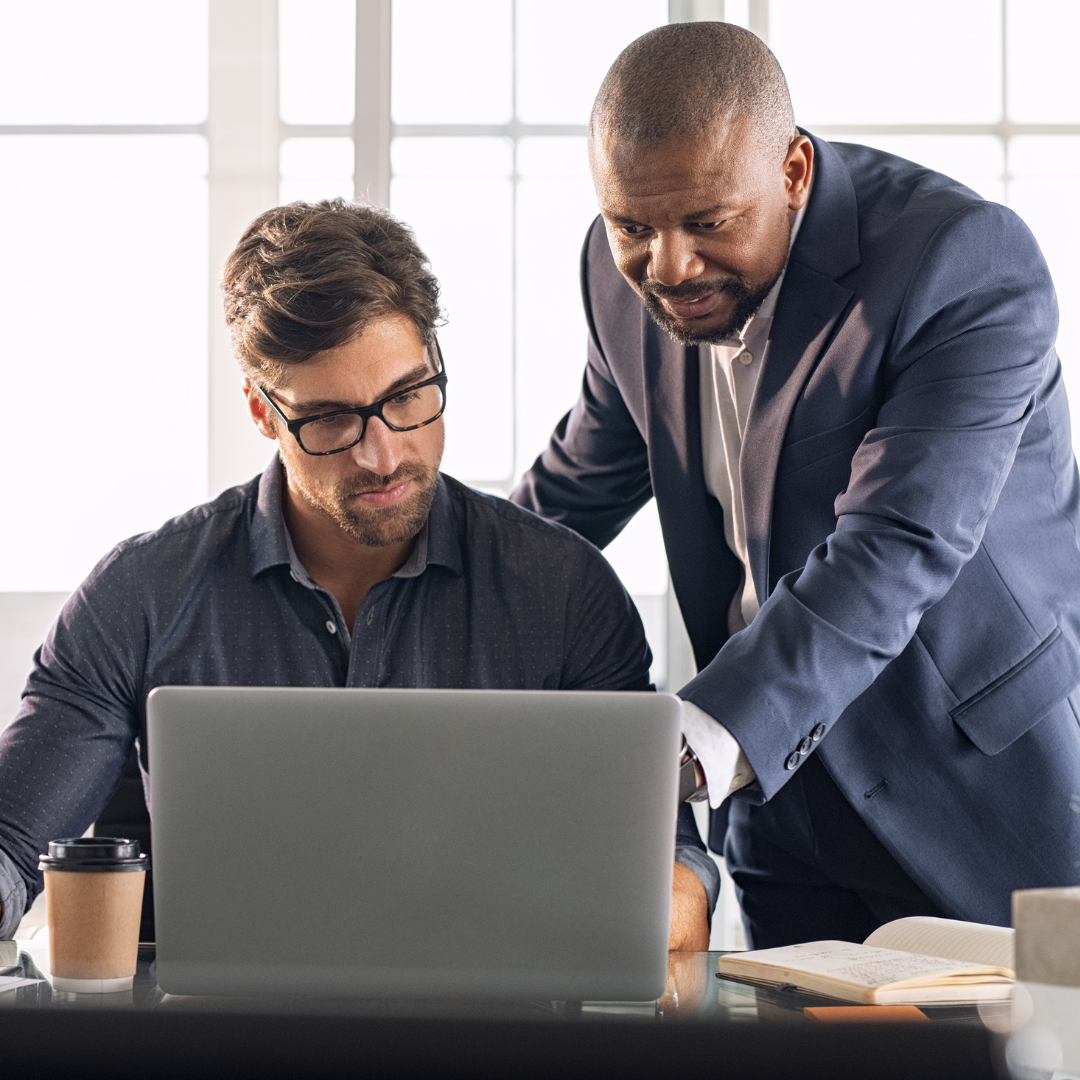 One Man Advising Another in Business