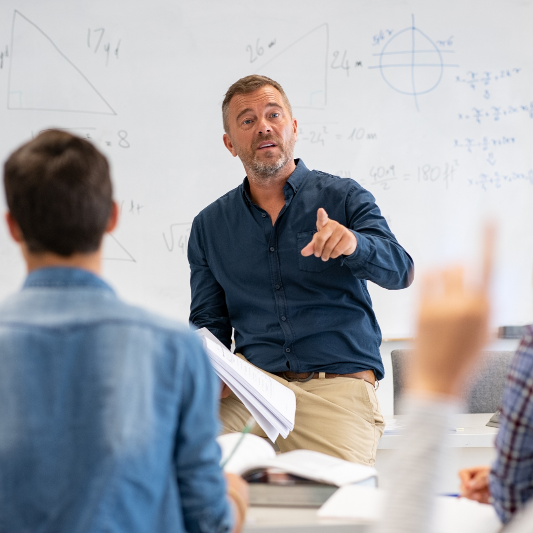 Teacher taking a student's question