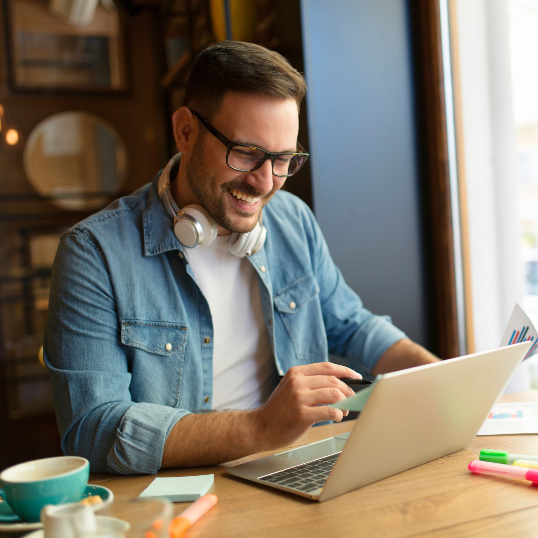 Freelance Instructional Designer Working on Computer