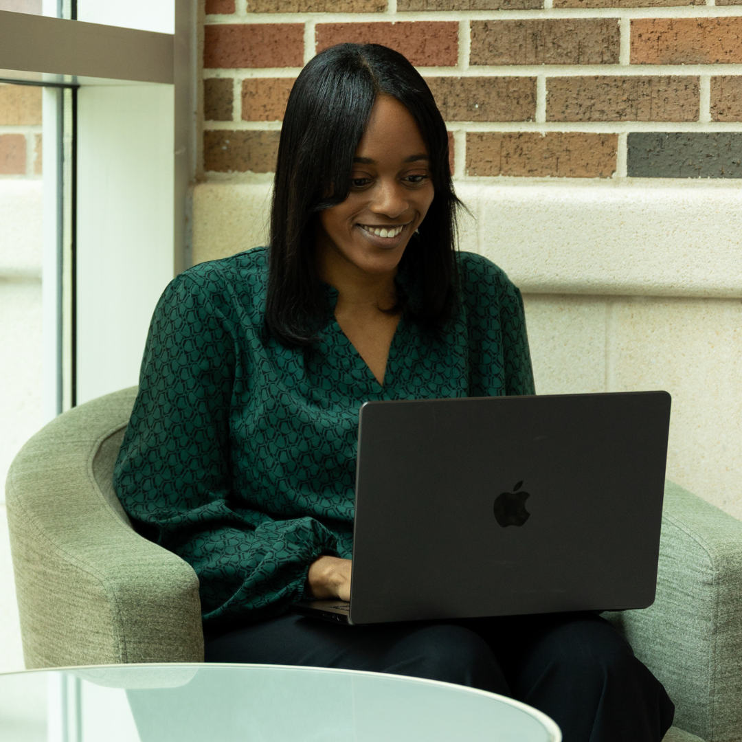 adult student working on computer