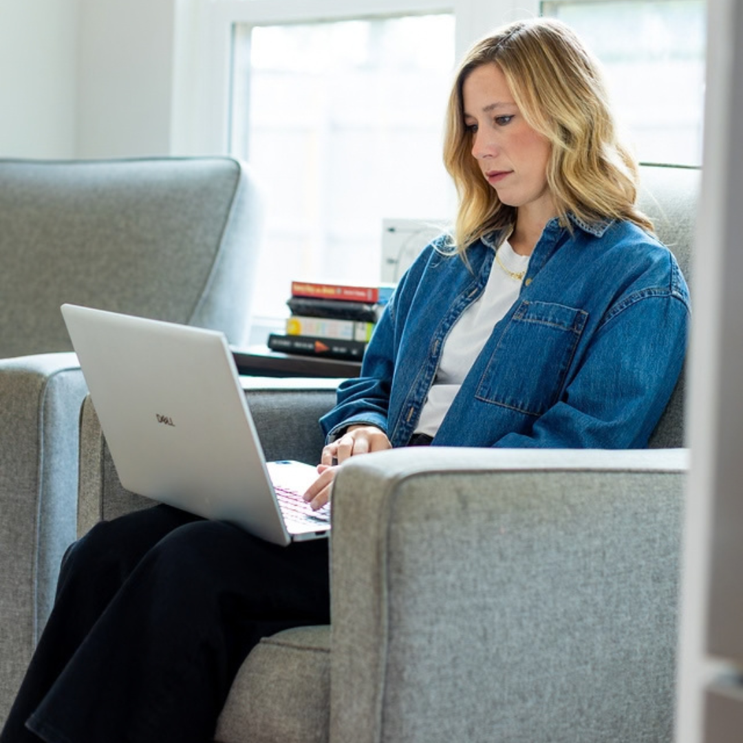 Adult Student Working on a Laptop Computer