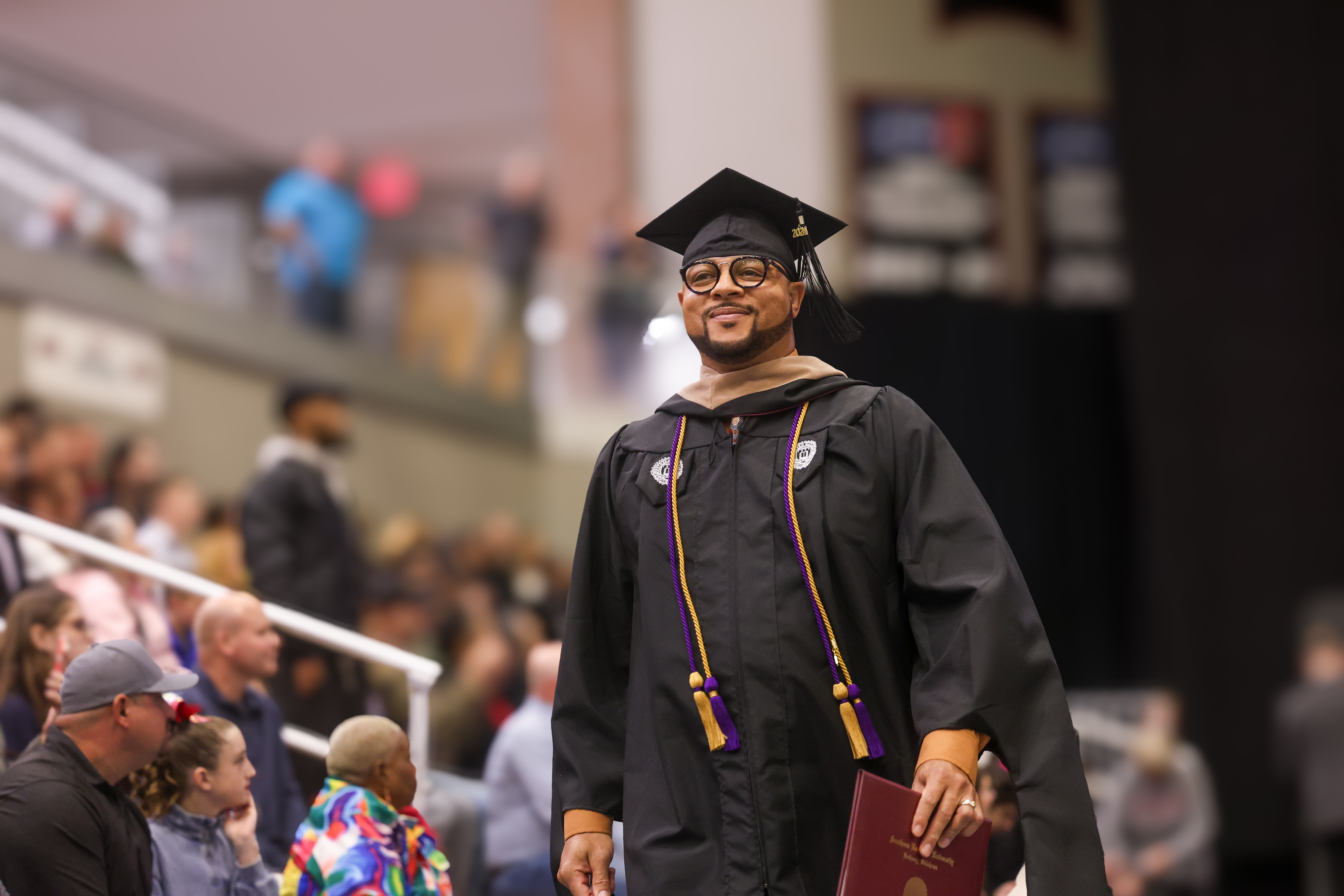 Adam Edwards graduating with his MBA in Healthcare Administration