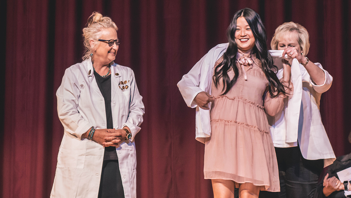 nursing student receiving white coat