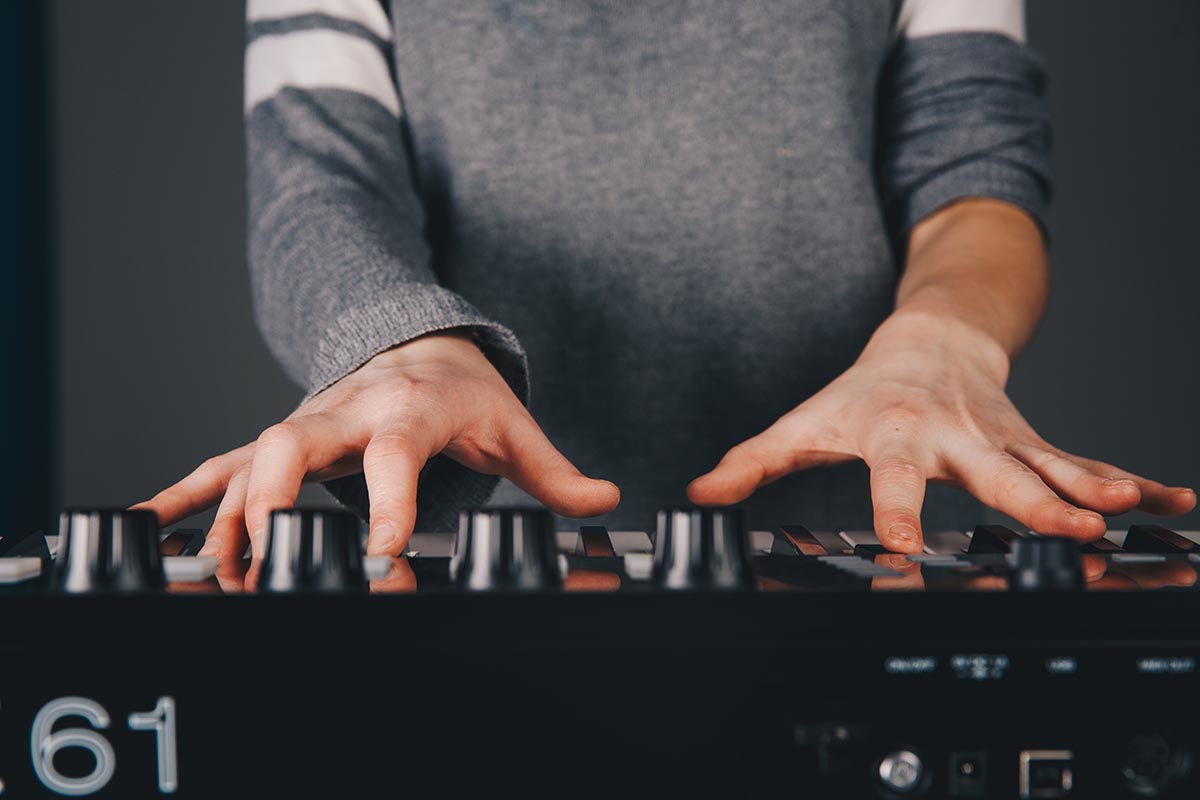 girl playing a keyboard