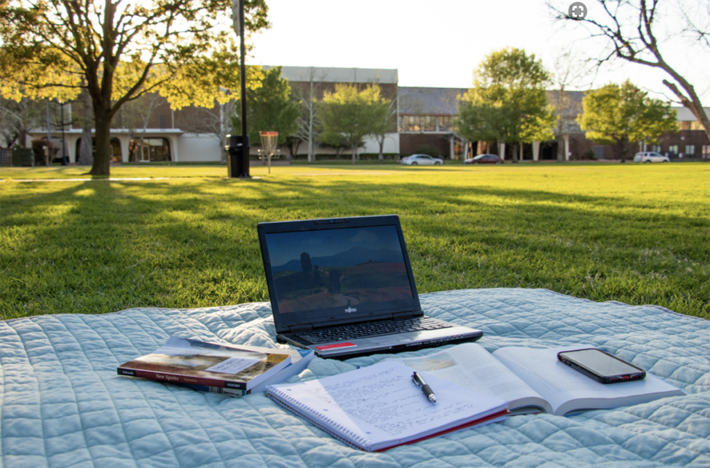 computer on grass outside