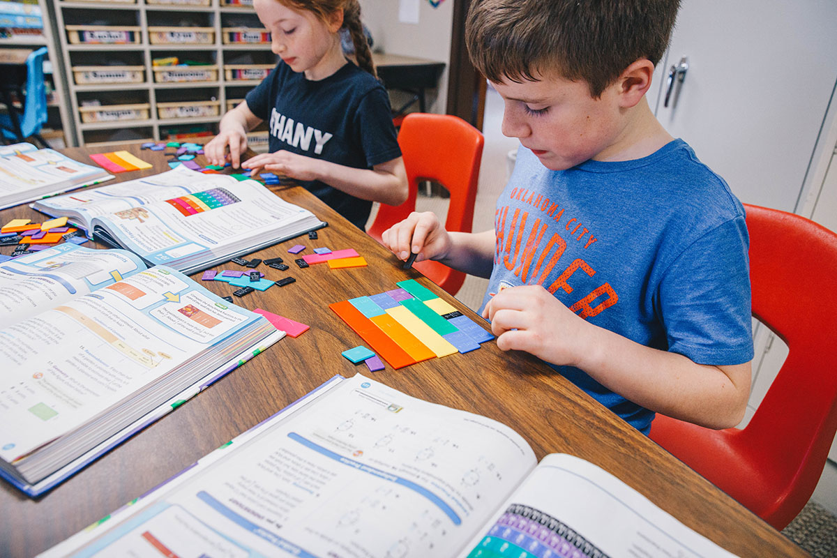 Elementary students work in class