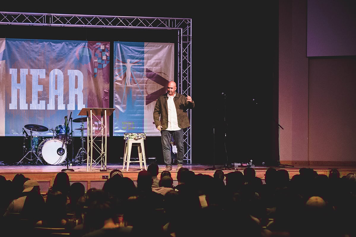 campus pastor preaching in chapel