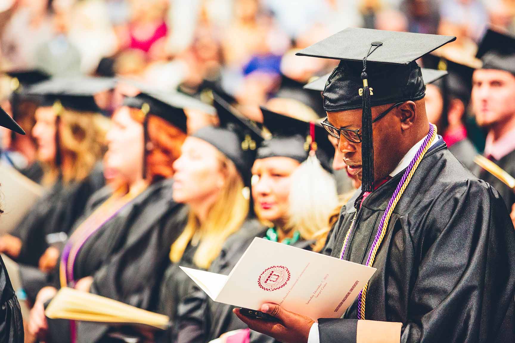 SNU graduate sitting at December 2019 Commencement