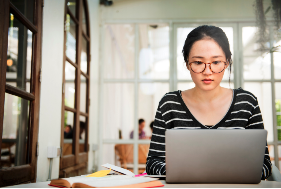 Adult student working at laptop