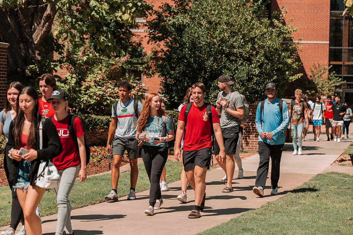 students walking across campus