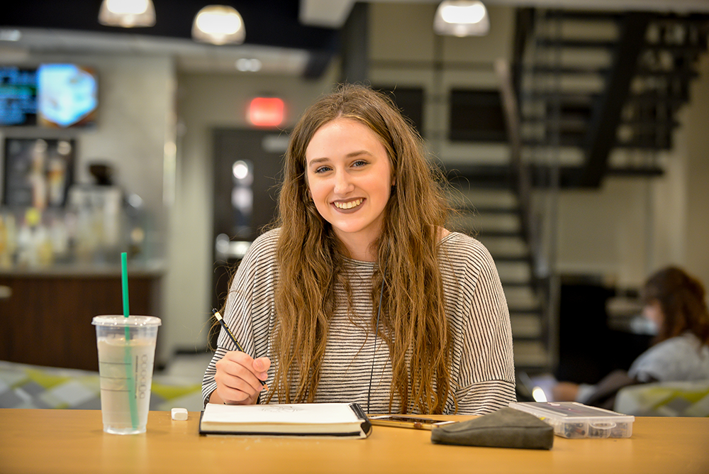 student in coffee shop