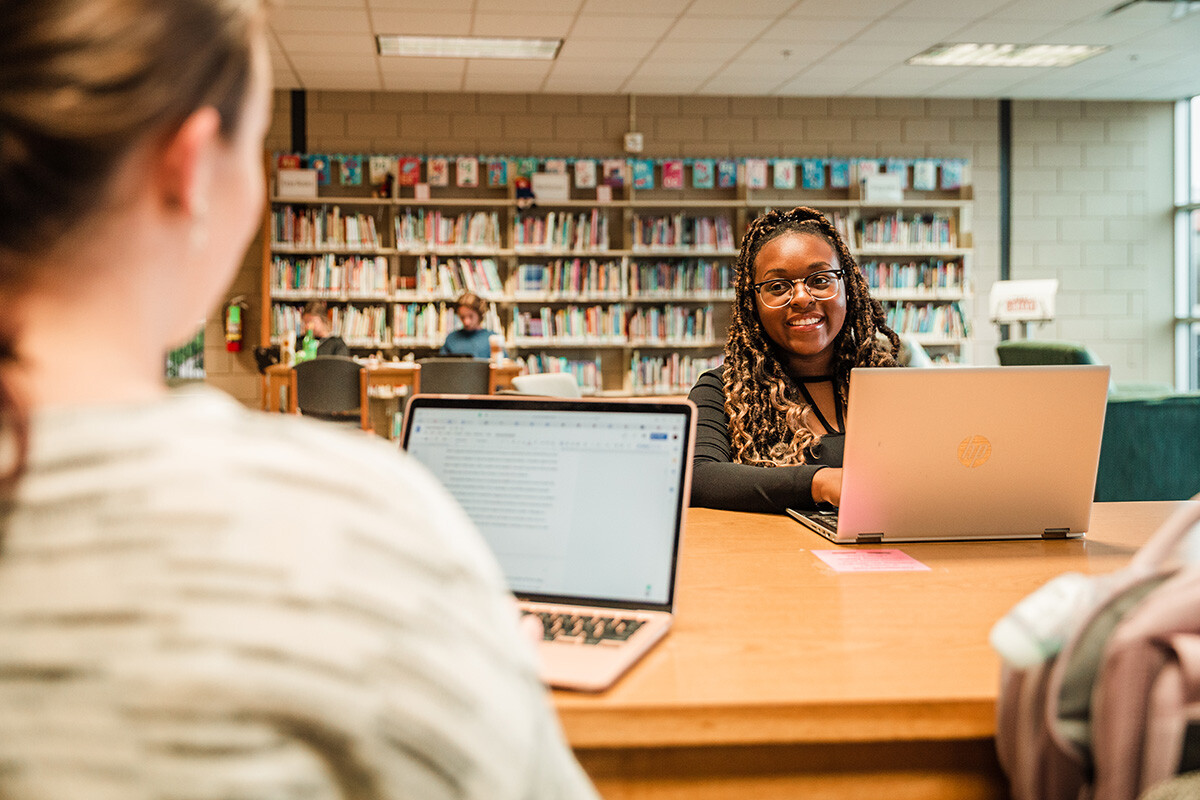 students studying in the library